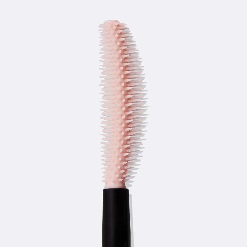 Close-up of pink curved brush for Mary Kay&reg; Great Heights&trade; Mascara standing up