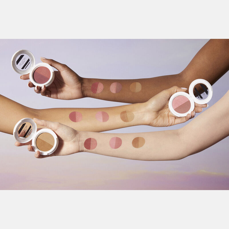 Three arms of varying skin tones showing product swatches of Mary Kay At Play Blush Duos and Mary Kay At Play Bronzer Duo.