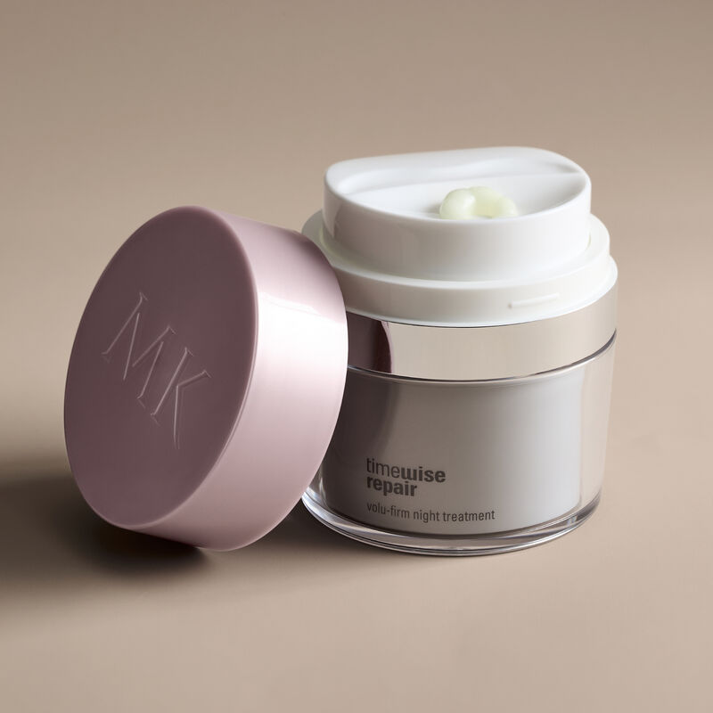 Stand-alone of Night Treatment open jar with formula on top