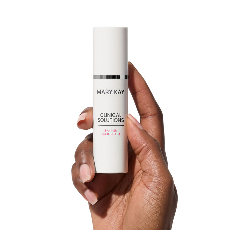 Hand holding bottle of Mary Kay Clinical Solutions Barrier Restore 1:1:3  image number null