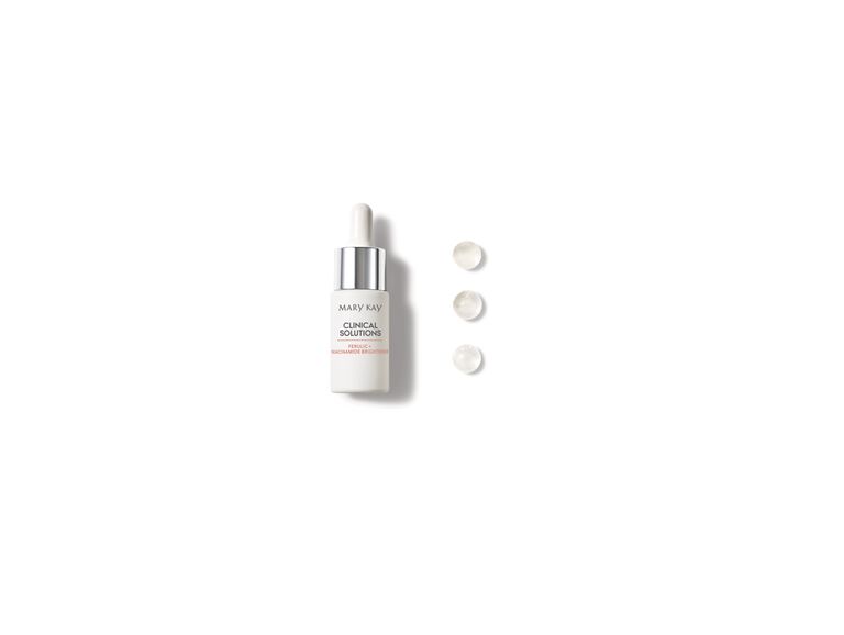 Botella del Iluminador &Aacute;cido Fer&uacute;lico + Niacinamida de Mary Kay&reg; Clinical Solutions con gotas a su lado
